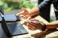 Close-up Businessman hands holding stylus pen and working on tablet Royalty Free Stock Photo