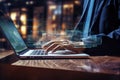 Close up of businessman hands typing on laptop keyboard with cityscape background, Businessman's hand in a modern o Royalty Free Stock Photo