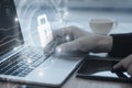 Close up of businessman hands using laptop keyboard on desktop with glowing circuit padlock hologram on blurry background. Secure Royalty Free Stock Photo