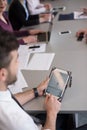 Close up of businessman hands using tablet on meeting Royalty Free Stock Photo