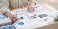 Close Up Of A Businessman Holding Graph Paper And Pen Royalty Free Stock Photo