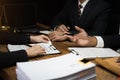 Close up businessman or Lawyer signing contract making a deal, classic business at office in the morning Royalty Free Stock Photo