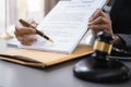 Close up businessman or Lawyer signing contract making a deal, classic business at office in the morning Royalty Free Stock Photo