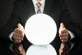 Businessman Predicting Future With Crystal Ball Royalty Free Stock Photo