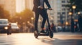 Close-up of businessman riding electric scooter in city