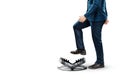 Close-up of a businessman`s foot over a bear trap. The concept of problem solving, failure, crisis, crisis management, mixed medi