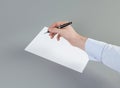 Close up of businessman's hand intending to write a document, petition or claim. Royalty Free Stock Photo