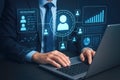 Close-up of Businessman Typing on Laptop with Holographic Recruitment Analytics Display computer technology Royalty Free Stock Photo