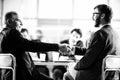 close up. businessman shaking hands with an elderly business lady. Royalty Free Stock Photo