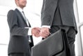 Close up.businessman shaking hands with his business partner Royalty Free Stock Photo