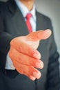 Close up businessman showing handshake sign to partner Royalty Free Stock Photo