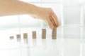 Close up. businessman stacking coins in stacks on a glass table Royalty Free Stock Photo