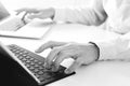 close up of businessman typing keyboard with laptop computer and Royalty Free Stock Photo