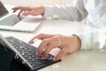 close up of businessman typing keyboard with laptop computer and Royalty Free Stock Photo