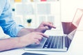 Close up of businessman typing at laptop Royalty Free Stock Photo