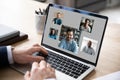 Male employee have webcam conference with diverse colleagues Royalty Free Stock Photo