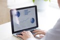 Close up businessman using laptop, analyze business statistics