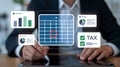 Tax planning calendar on digital tablet shows financial data charts and analysis for business growth strategy Royalty Free Stock Photo