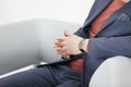 Close up.businessman with a watch, sitting in the office