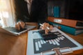 Close up of businessman working on calculator to calculate financial. Royalty Free Stock Photo