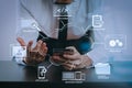 close up of businessman working with smart phone on wooden desk Royalty Free Stock Photo