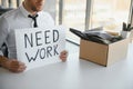 Close-up Of A Businessperson Carrying Cardboard Box During Office Meeting Royalty Free Stock Photo