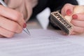 Businessperson Hand With Pen And Stamp