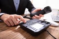 Person`s Hand Dialing Telephone Number To Make Phone Call Royalty Free Stock Photo