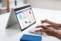 Businessperson Doing Online Shopping On Digital Laptop