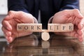 Protecting Balance Between Life And Work On Seesaw Royalty Free Stock Photo