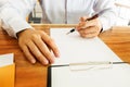 Close-up Of Businessperson Signing Contract,woman writing paper Royalty Free Stock Photo