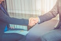 Close up businesswoman and businessman shaking hand for congratulation for success of business concept Royalty Free Stock Photo