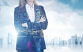 Close up of businesswoman with crossed arms in a city Royalty Free Stock Photo