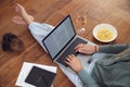 Close Up Of Businesswoman At End Of Day With Wine In Loungewear And Suit On Laptop Working At Home Royalty Free Stock Photo