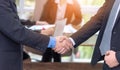 Close up of businesswoman and partnership shaking hands for agreement project during board meeting in the office . Business people Royalty Free Stock Photo