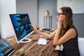 Businesswoman Analyzing Graph On Computer Royalty Free Stock Photo