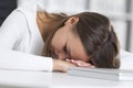 Close up of businesswoman sleeping at work Royalty Free Stock Photo