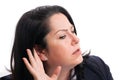 Close-up of businesswoman touching ear as listening concept Royalty Free Stock Photo