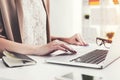 Close up of businesswoman typing at laptop Royalty Free Stock Photo