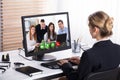 Businesswoman Video Conference With Her Colleagues