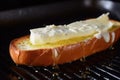 close-up of butter melting on hot garlic bread