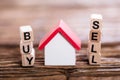 Buy Or Sell Option With Small House Model Royalty Free Stock Photo