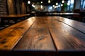 Close up on cafe tables wood texture, bokeh backdrop adds charm