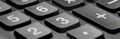 Close-up of a calculator buttons. panorama of black buttons. background of financial calculations Royalty Free Stock Photo