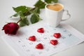 Close up of calendar, hearts, coffee and red rose Royalty Free Stock Photo