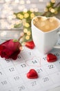 Close up of calendar, hearts, coffee and red rose Royalty Free Stock Photo