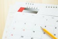 Close up Calendar page number. pencil yellow to mark the desired date to remind memory on the table. Royalty Free Stock Photo