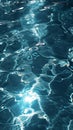 Close-up of calm water surface with gentle ripples and sparkling sunlight reflections Royalty Free Stock Photo