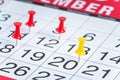 Calendar Page with Colourful Thumbtacks Royalty Free Stock Photo