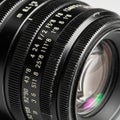 Close-up of a camera lens, displaying multiple dials with engr Royalty Free Stock Photo